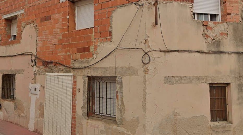 Potential to convert into two residential houses with a commercial bar.